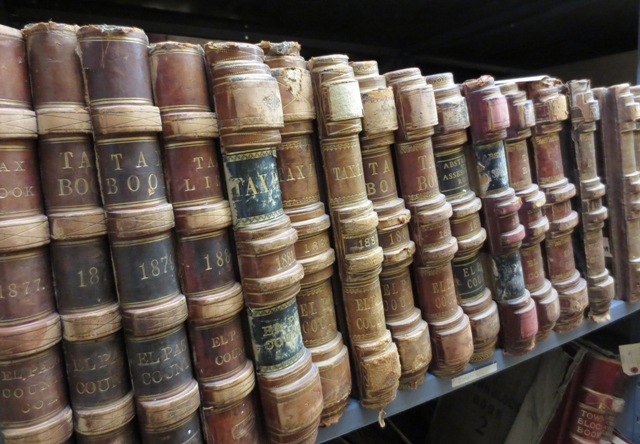 Photo of antique books on a shelf