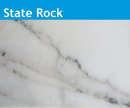 An image of the Colorado State Rock, yule marble, white with black lines throughout.